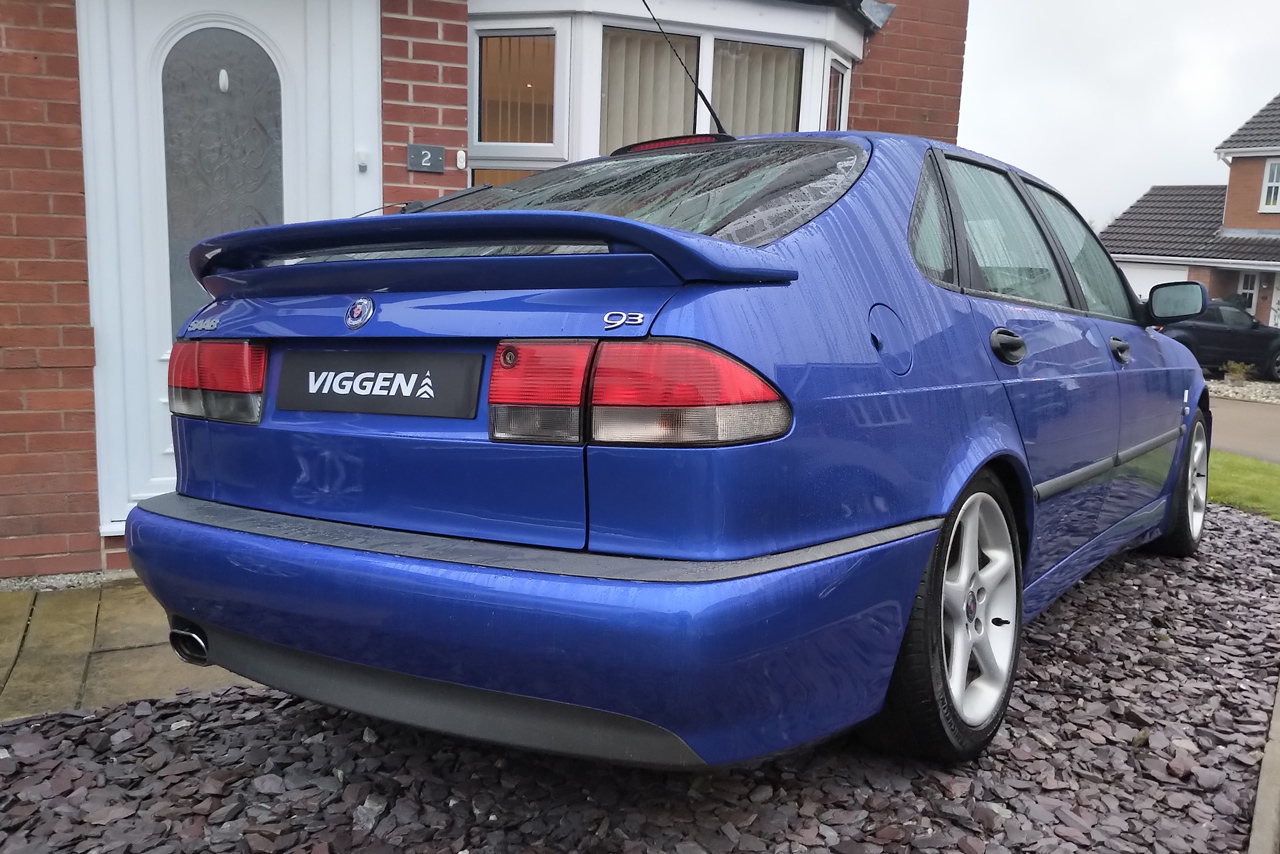 Blue Saab 9-3 Viggen parked at house