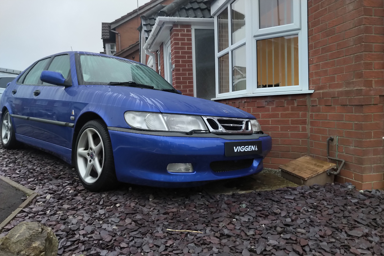 Blue Saab 9-3 Viggen outside house