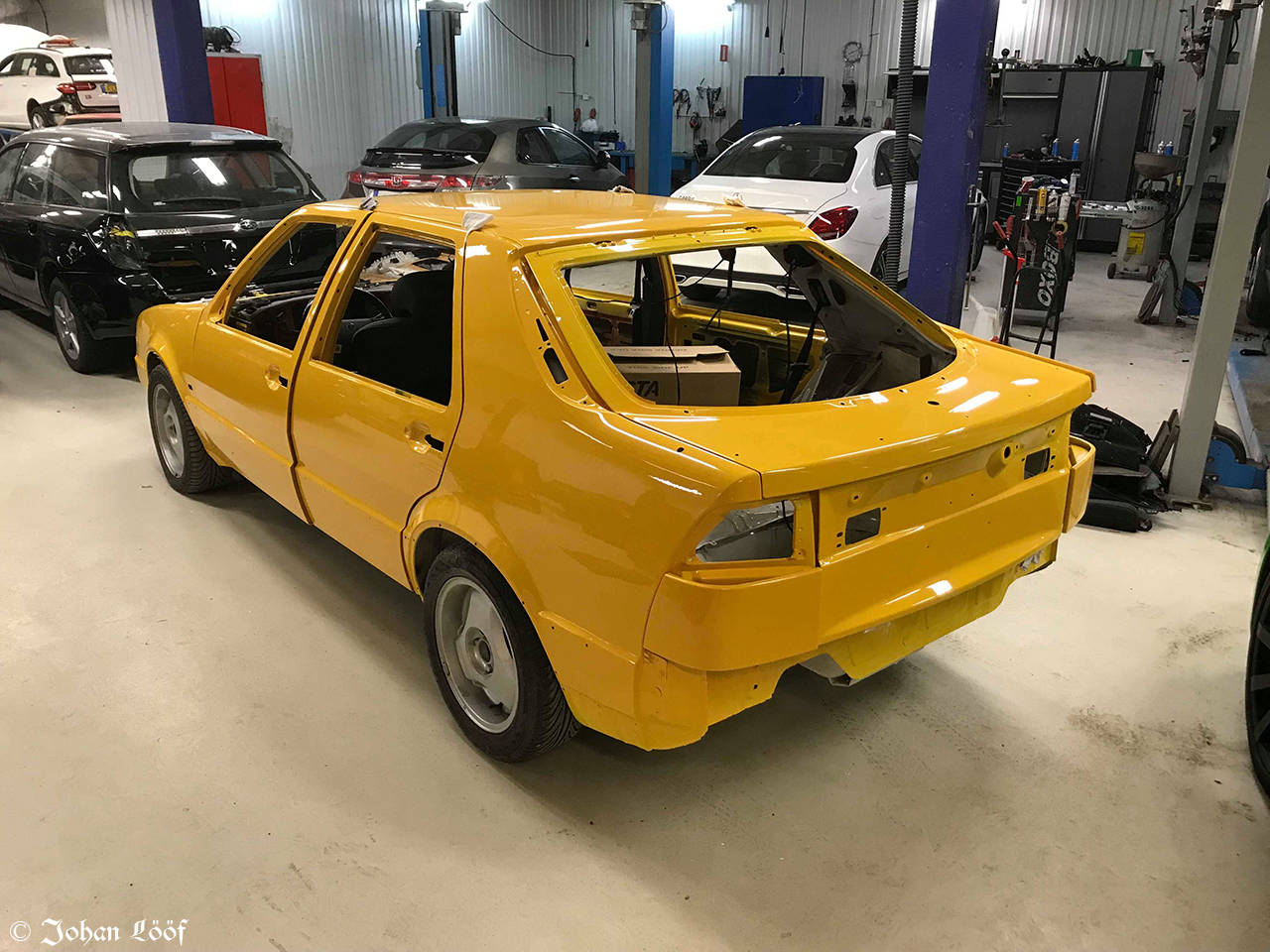 Yellow Saab 9000